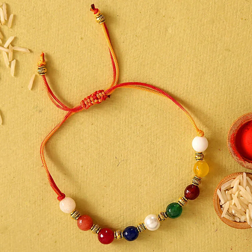 Beautiful Navrattan Rakhi N Almonds Combo