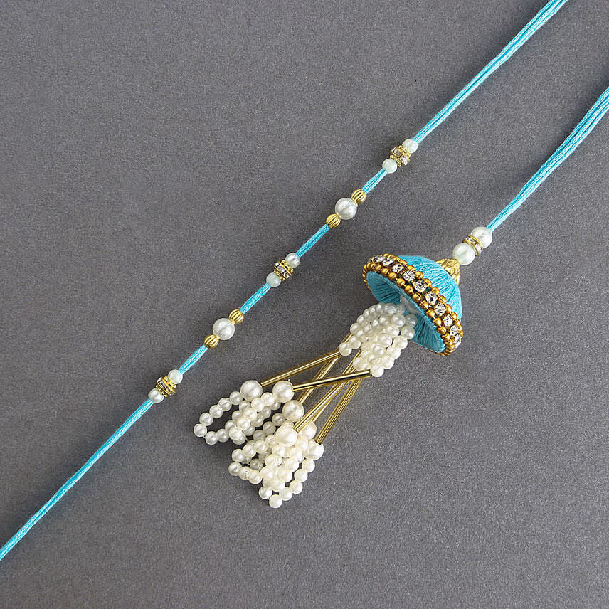 Teal Jhumar Lumba Pearl Rakhi Set N Besan Laddoo Surprise