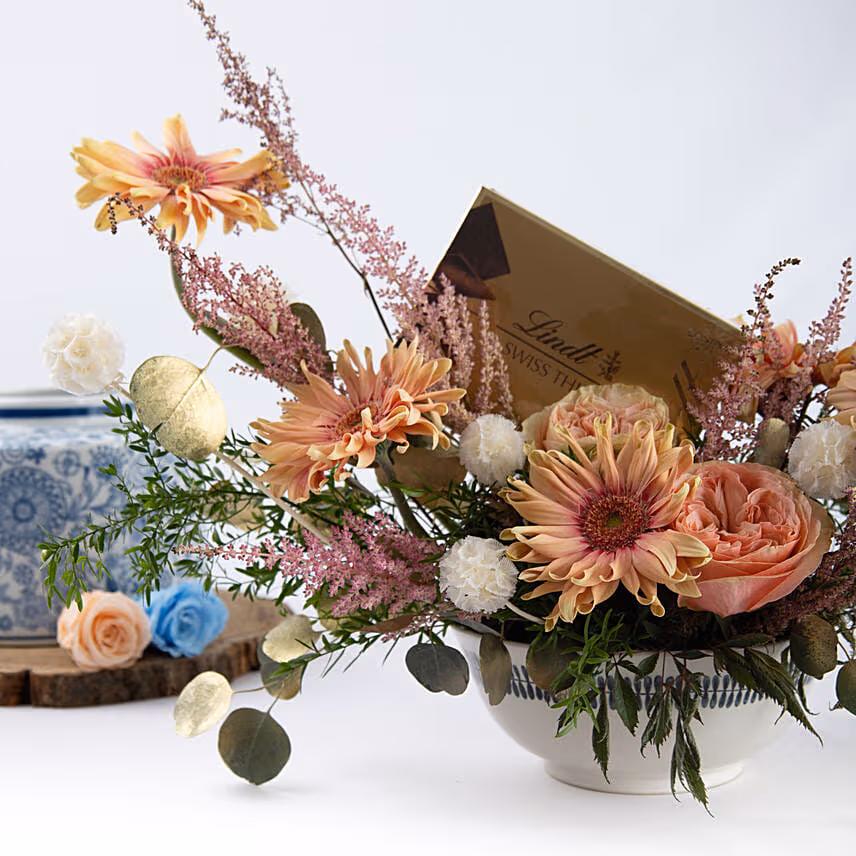 Ravishing Flowers Arrangement and Chocolate
