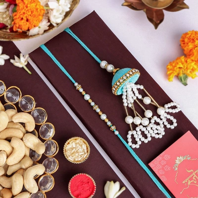 Elegant Tranquil Teal Pearl Rakhi Set with Cashew Combo for Bhaiya-Bhabhi