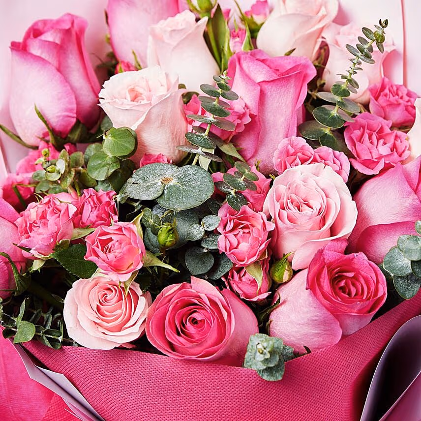Magnificent Mixed Roses Wrapped Bouquet With Cake