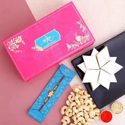 Exclusive Ganesha Face Kids Rakhi with Premium Cashew & Kaju Katli Gift Set