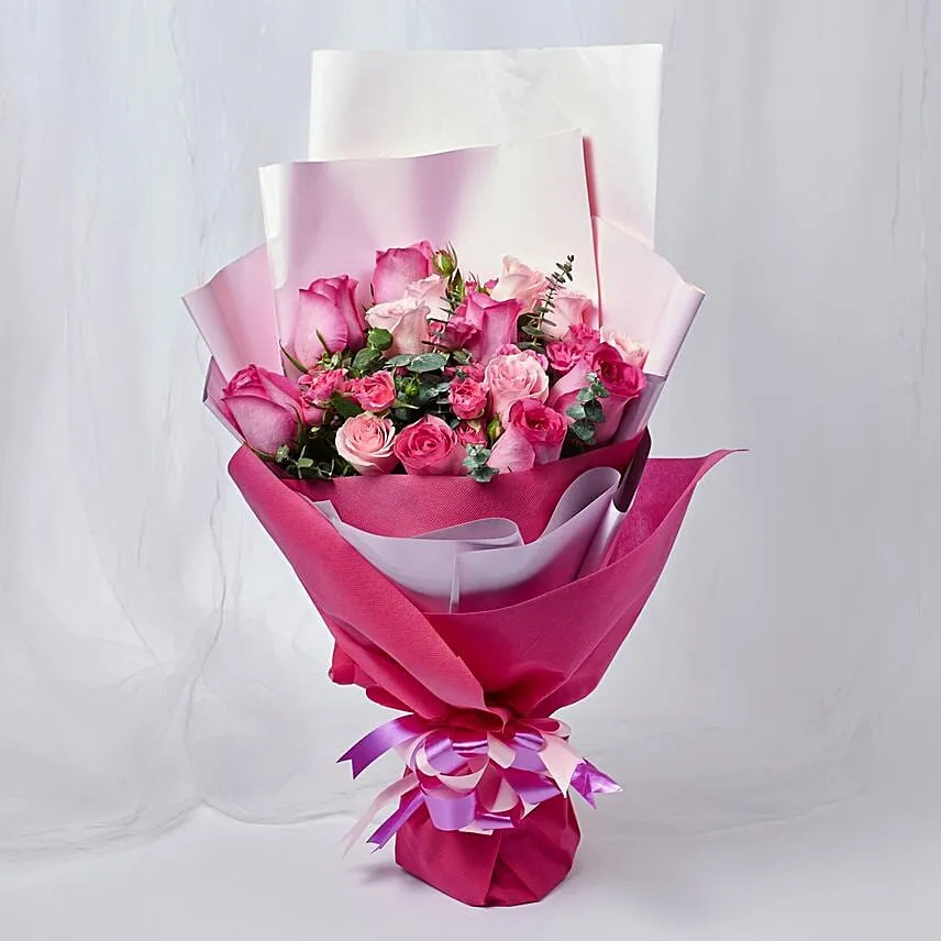 Magnificent Mixed Roses Wrapped Bouquet With Chocolate