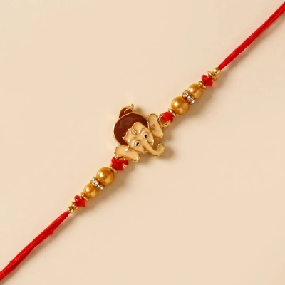 Charming Long Trunk Bal Ganesha Pearl Rakhi for Kids – Celebrate Raksha Bandhan with Elegance