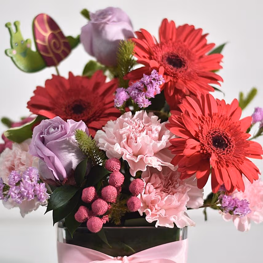 Lovely Mixed Flowers Arrangement In Glass Vase