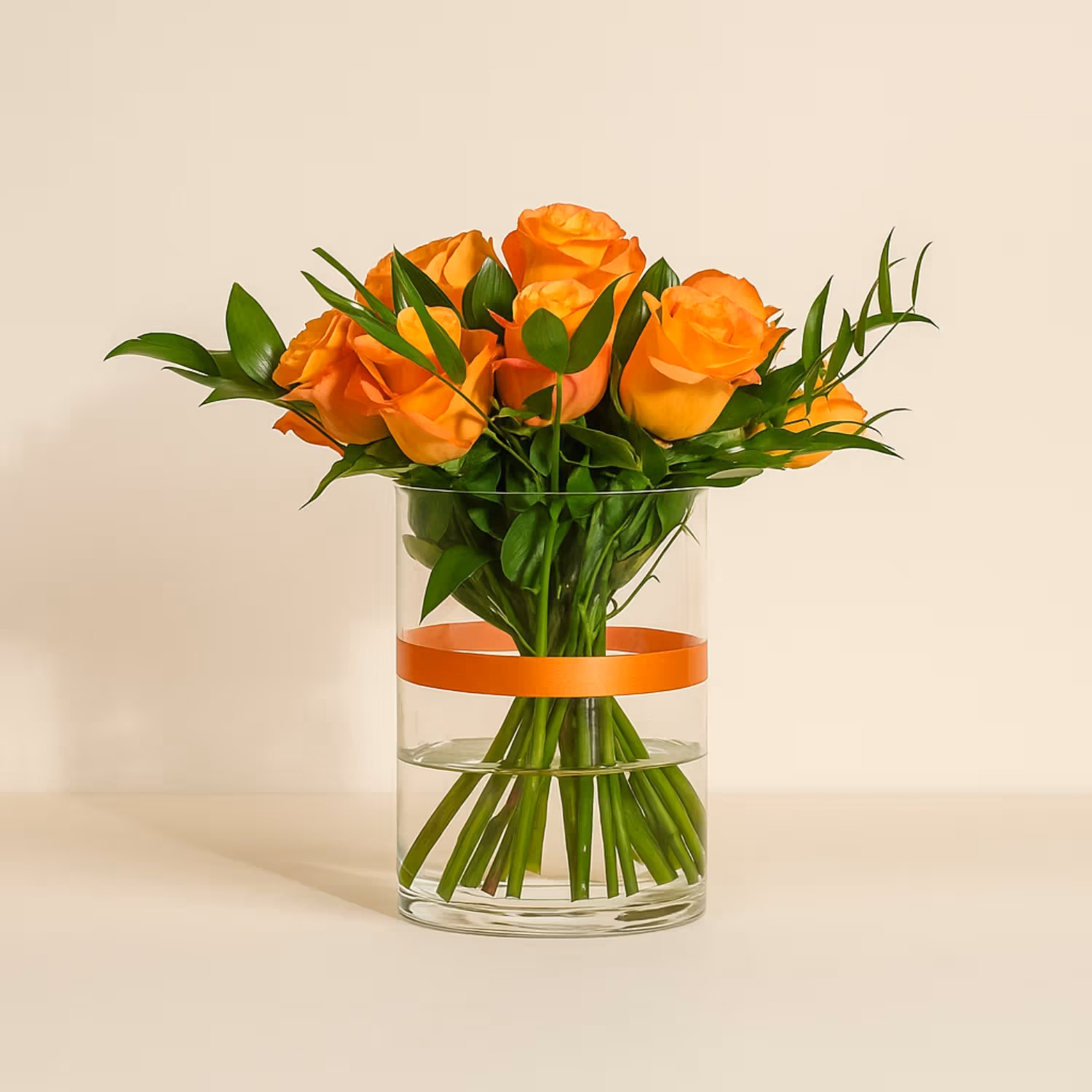 Orange Roses in Glass Vase