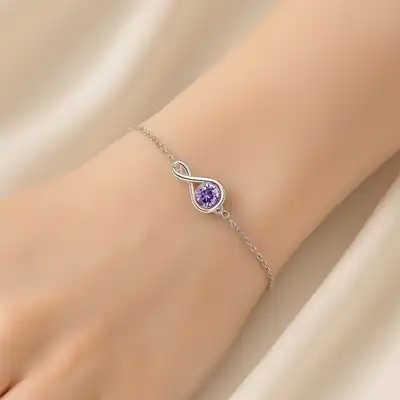 Elegant Purple Glow Silver Bracelet with Infinity Design