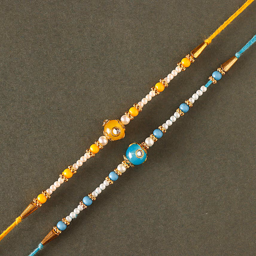 Sneh Vibrant Set Of 2 Pearl Rakhi & Butter Cookies