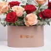 Exquisite Blend of Red and Peach Roses in a Luxury Box