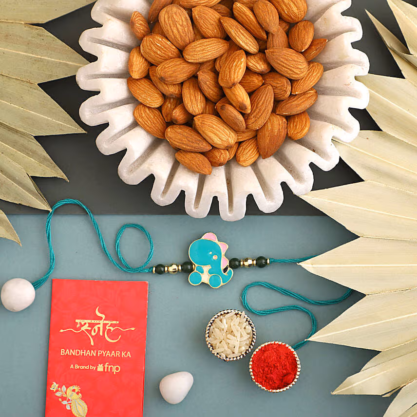 Sneh Lovely Dino Rakhi & Almonds