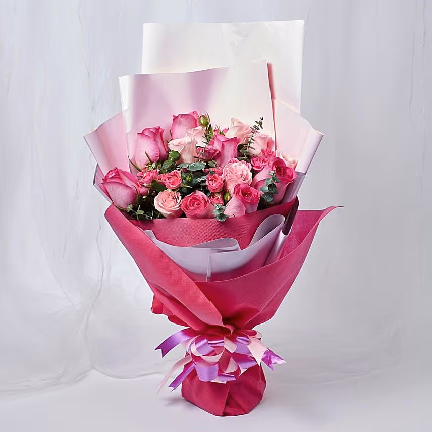 Magnificent Mixed Roses Wrapped Bouquet With Cake