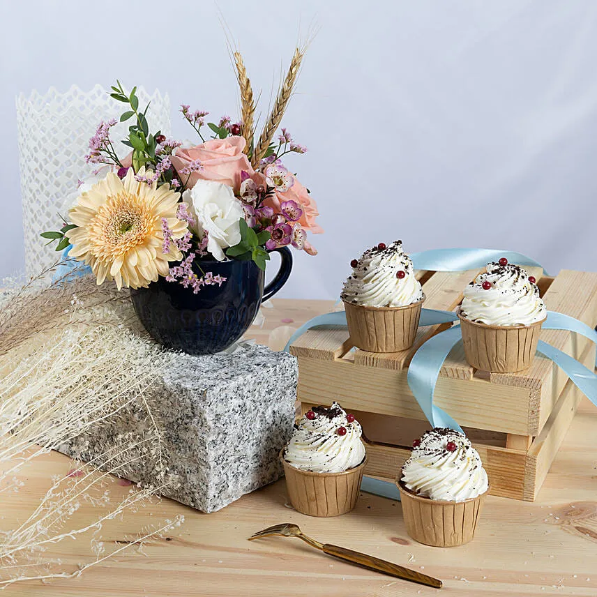 Flowers arrangment and Vanilla Cupcakes