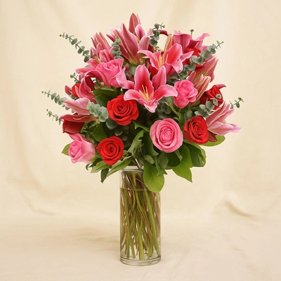 Mixed Roses Stargazer Lilies Glass Vase Arrangement