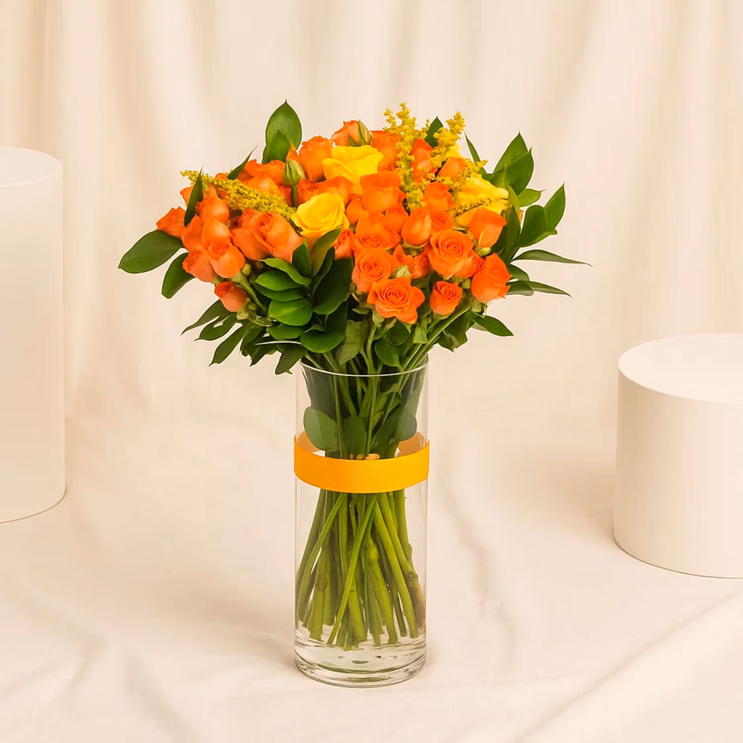 Orange And Yellow Rose Arrangement In A Vase