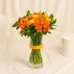 Orange And Yellow Rose Arrangement In A Vase