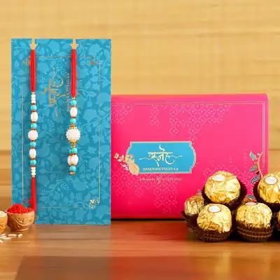 Elegant Blue Pearl Bhaiya Bhabhi Lumba Rakhi Set with 3 Ferrero Rocher Chocolates