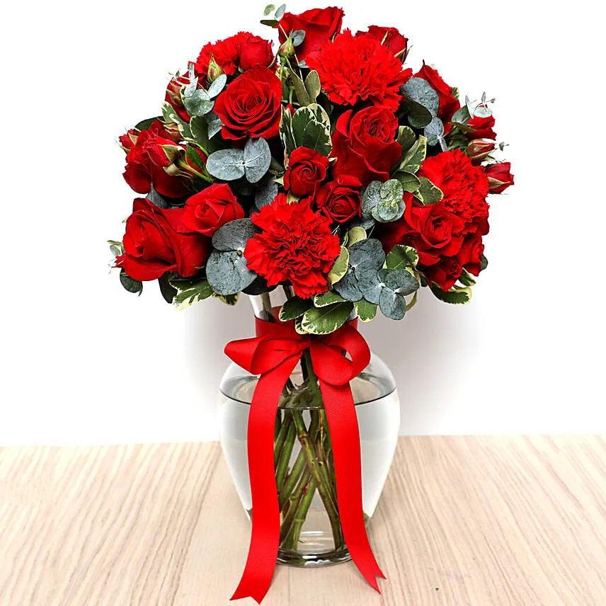 Red Flowers In Glass Vase With I Love You Table Top For Valentines