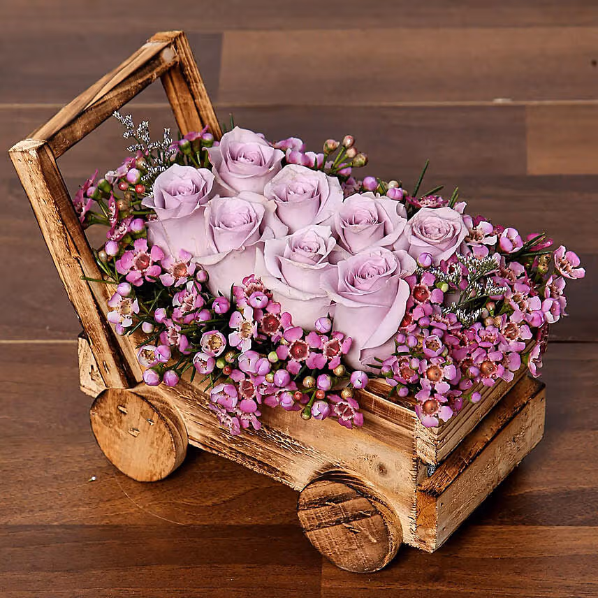 Purple Roses Beautifully Arranged In Cart