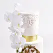 Choco Elegance Engagement Cake with Floral & Gold Accents