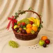 Deluxe Juicy Fruits Basket with Decorative Ivy and Wooden Handle