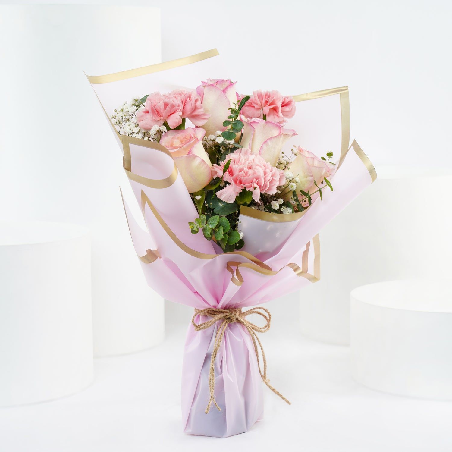 Elegant Floral Tribute: Pink Roses and Carnations Bouquet