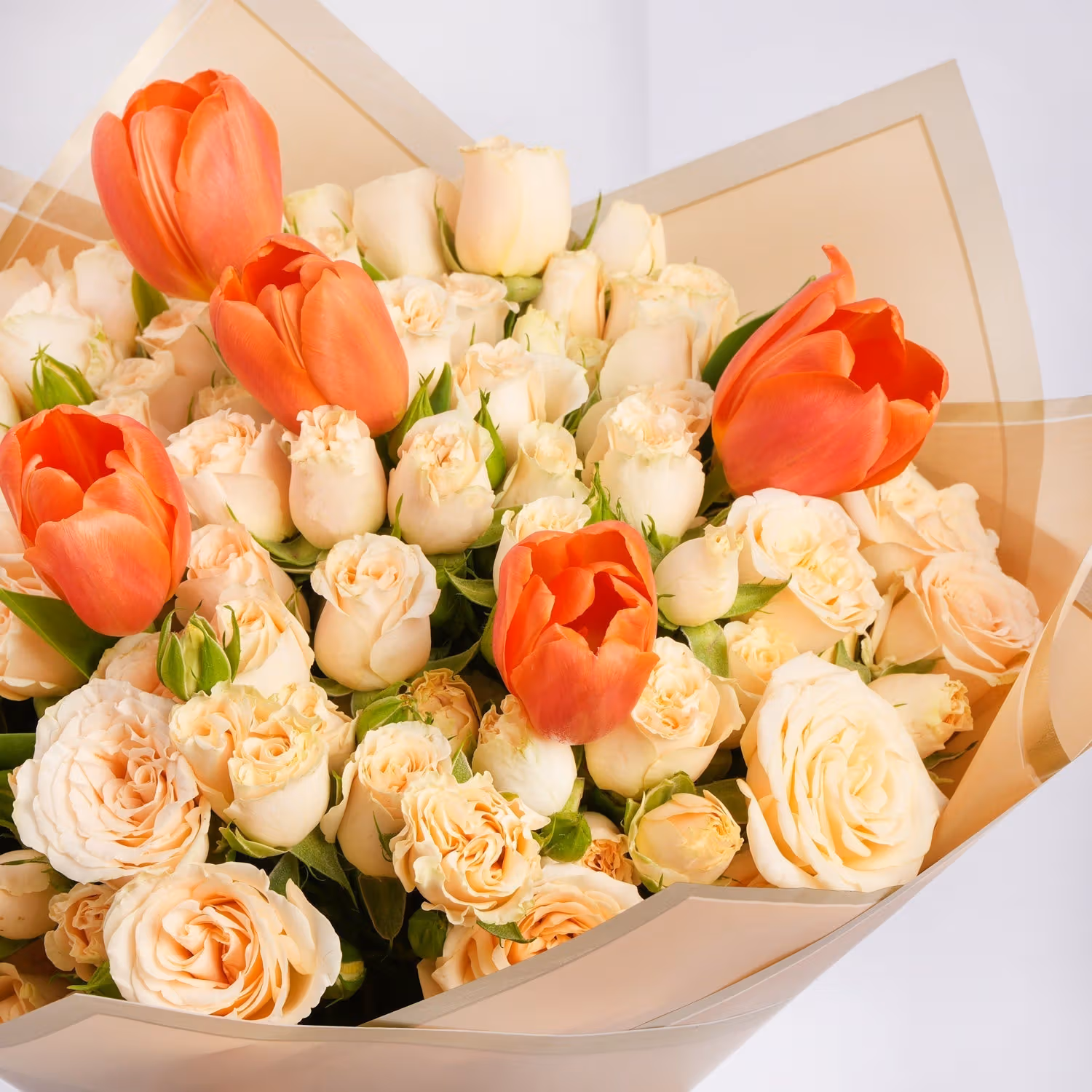 Chic Celebration Bouquet: Orange Tulips & Peach Roses