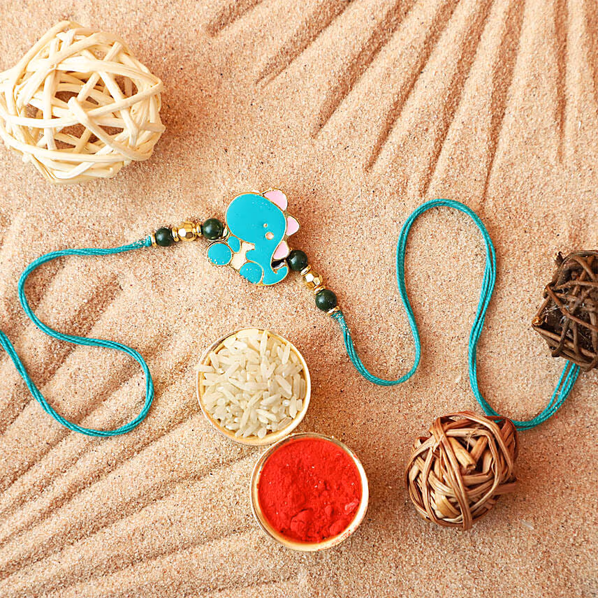 Sneh Lovely Dino Rakhi & Almonds