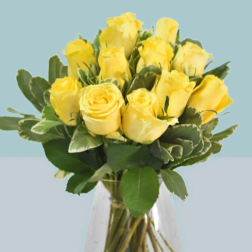 Yellow Roses Arrangement In A Glass Vase