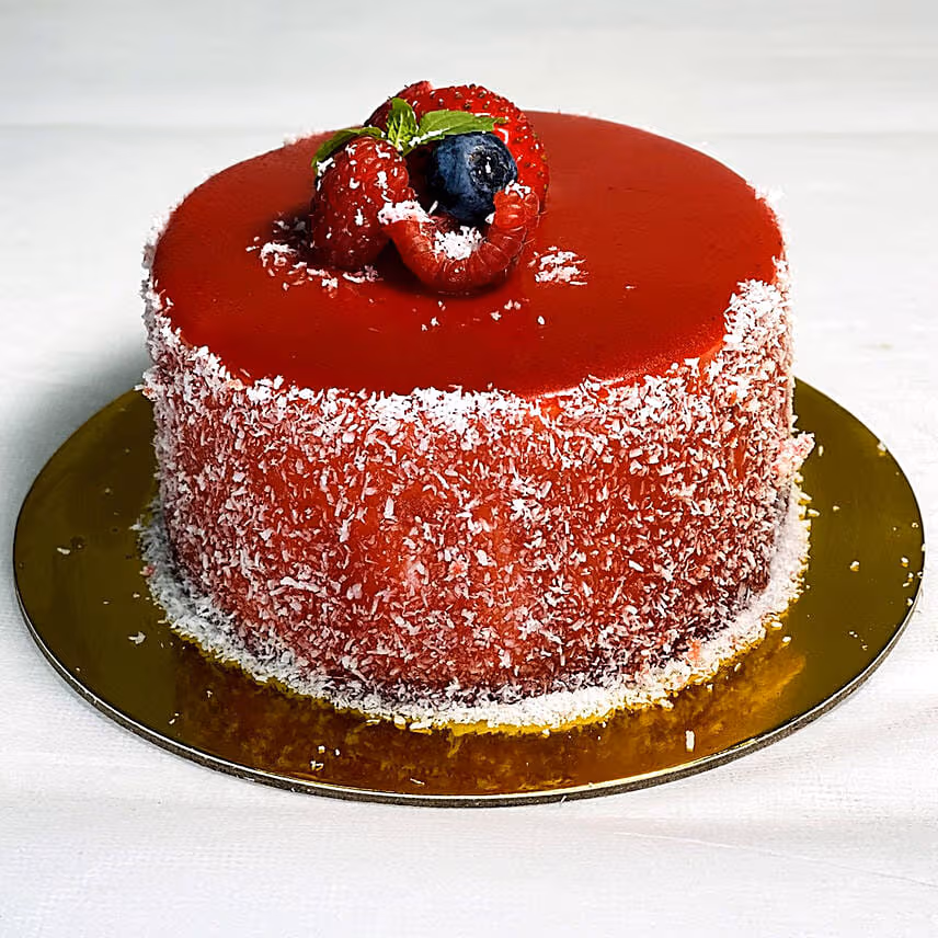 Red Elegance Gerbera Blossoms with Mini Mousse Cake