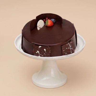 Decadent Chocolate Fudge Cake with Fresh Berries