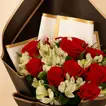 Red Roses And Alstroemeria In Black Wrapping For Graduation