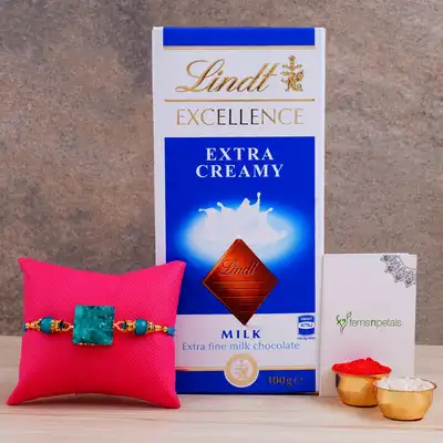 Elegant Green Agate Stone Rakhi with Lindt Extra Creamy Chocolate Gift Set