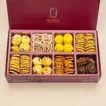 Luxurious Golden Eid Hamper with Elegant Flower Arrangement - Combos