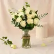 Vase Of Elegant White Roses