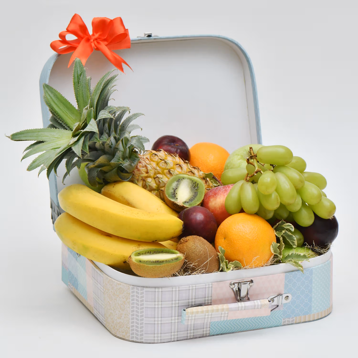 Deluxe Exotic Fruit Hamper in Elegant Floral Suitcase