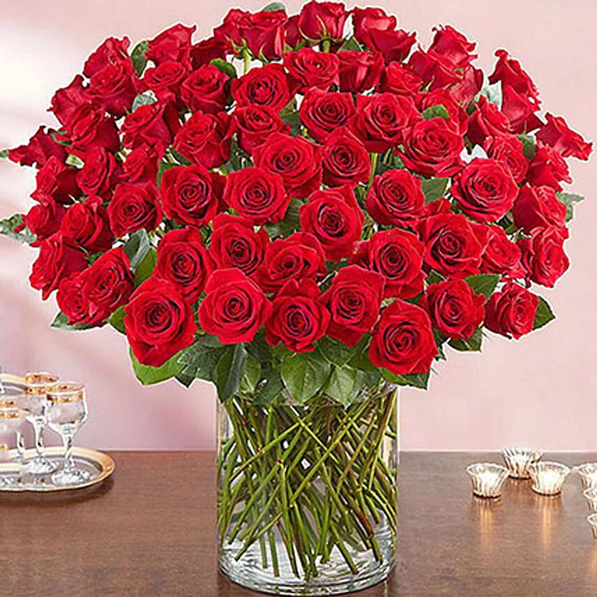 100 Red Roses In A Glass Vase