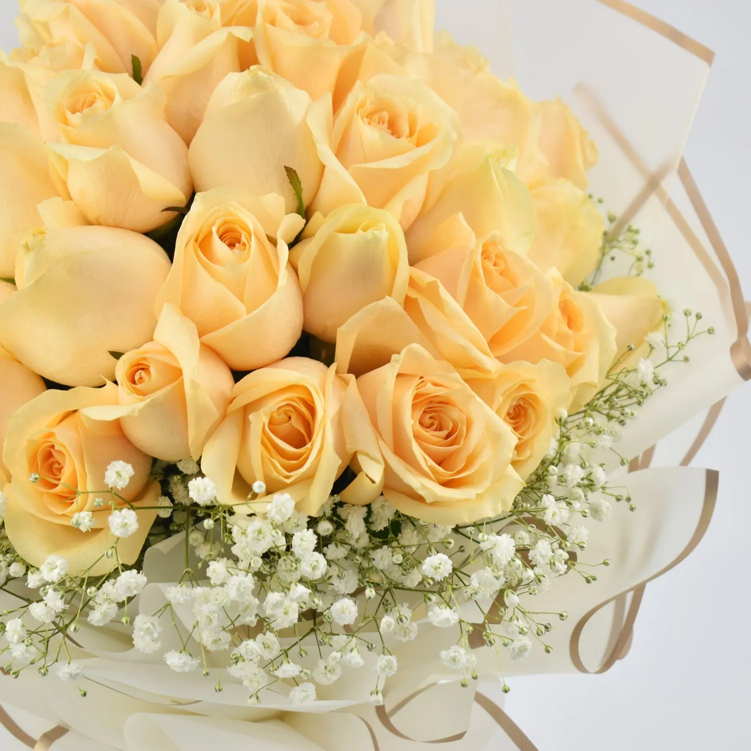 Elegant 35 Peach Roses Bouquet with Brown Wrapping and White Ribbon