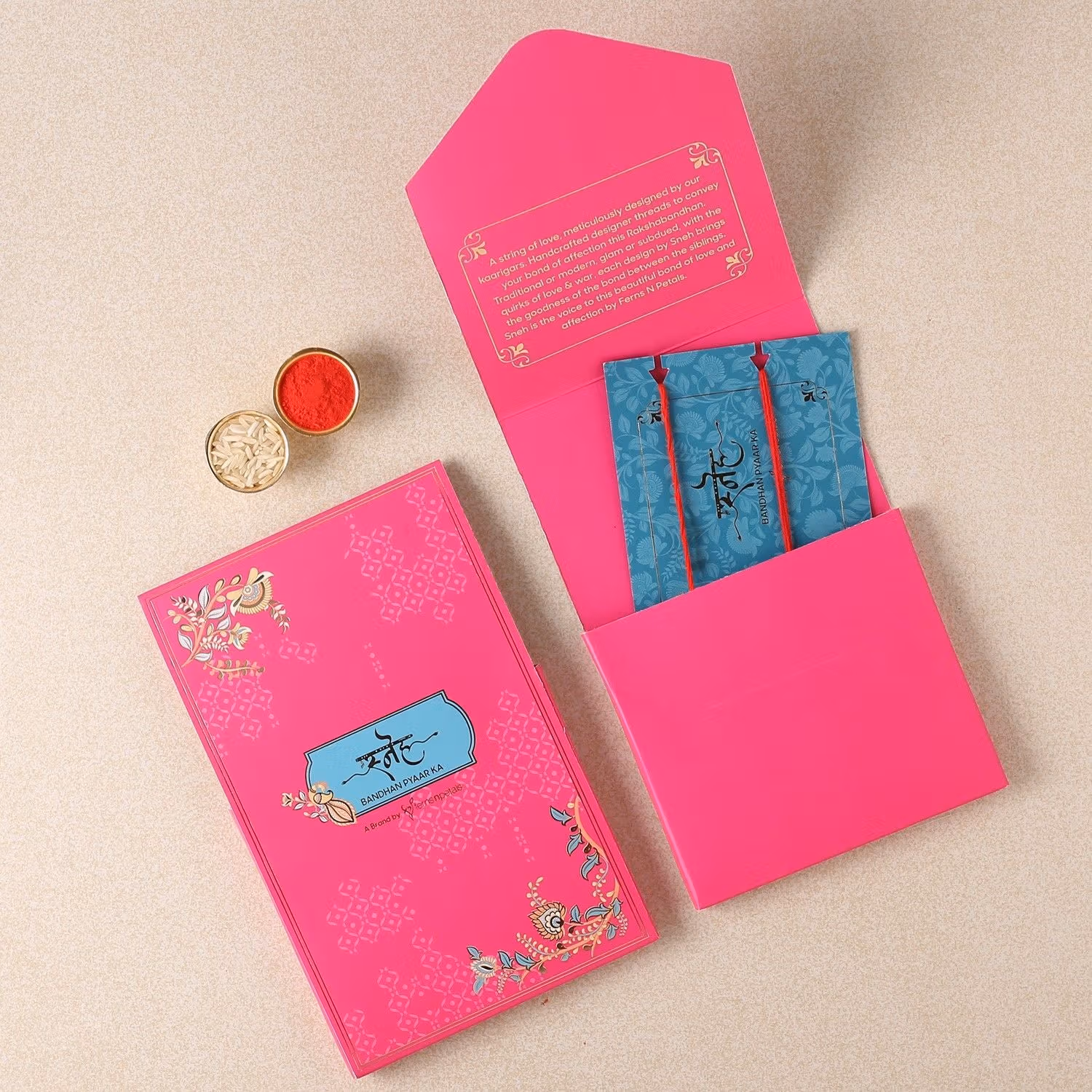 Sneh Colourful Pearl Rakhi Set & Rasgullas