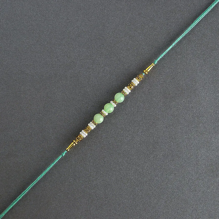 Graceful Pearl Ethnic Rakhi Green