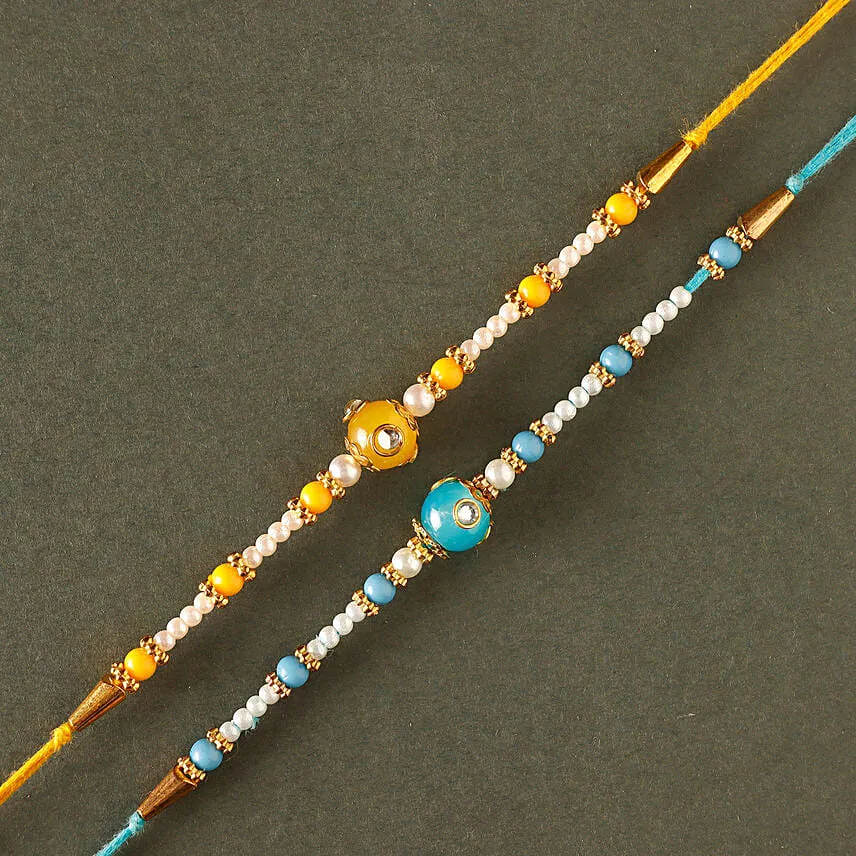 Sneh Vibrant Set Of 2 Pearl Rakhis & Soan Papdi