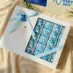 Heavenly Blue Welcome Bloom with Opera Chocolates