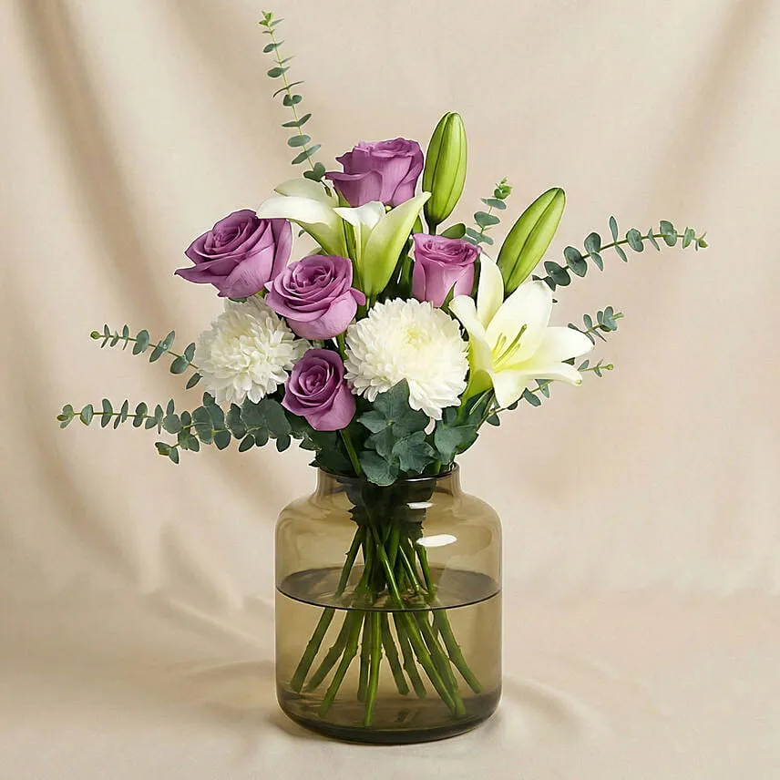 Lovely Mixed Flowers Oval Shaped Vase