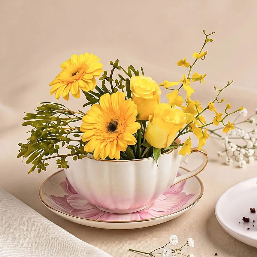 Sunny Teacup Flower Arrangement & Cheesecake Slice