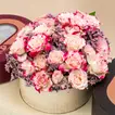 Elegant Crescent Bloom with Gourmet Chocolate Selection