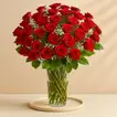 Luxurious Bouquet of 50 Scarlet Red Roses with Elegant Fillers in a Glass Vase
