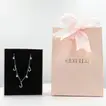 Elegant Sterling Silver Necklace with Arabic Letter 'L' Design