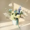 Ocean Breeze Floral Elegance in a White Pot