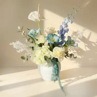 Ocean Breeze Floral Elegance in a White Pot