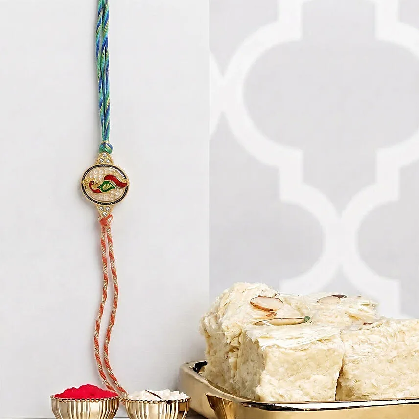 Multicolor Peacock Rakhi with Blue and Red Thread with Soan Papdi