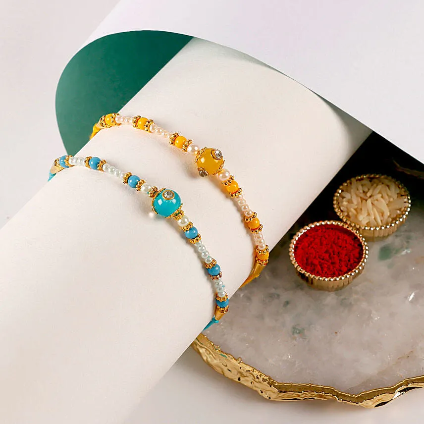 Sneh Vibrant Set Of 2 Pearl Rakhis & Almonds